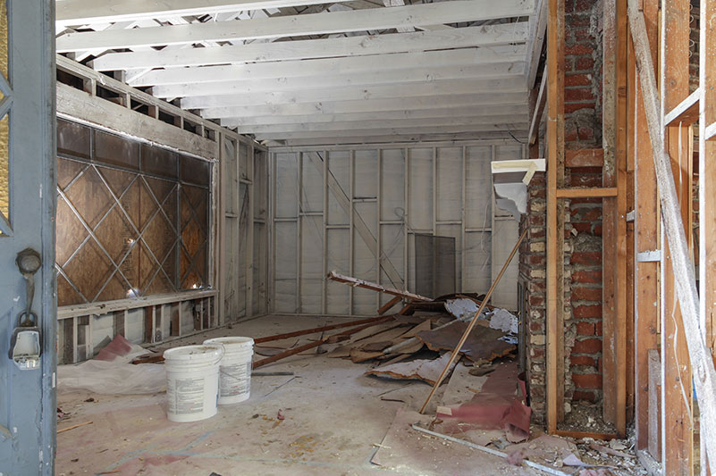 Residential home interior in the process of being repaired after fire damage